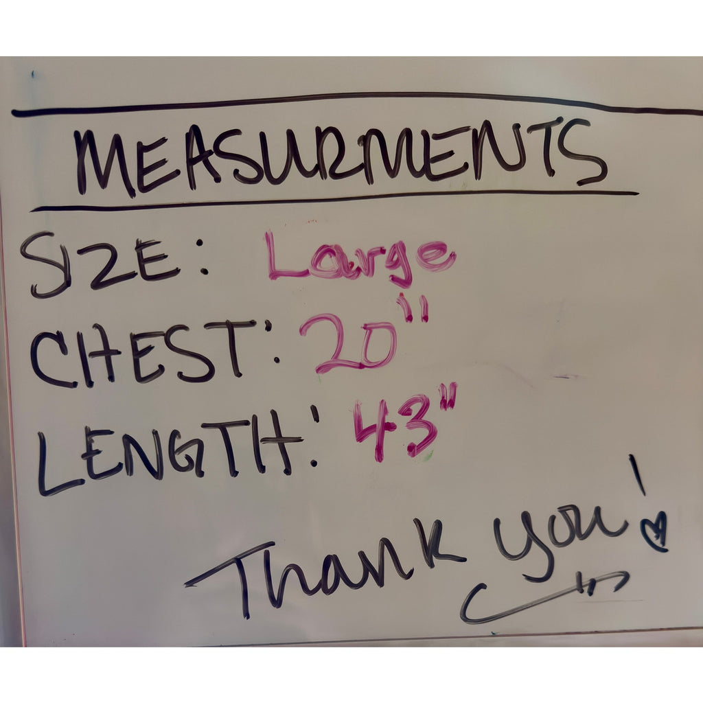 This is a bohemian-style floral geometric orange and tan button-down shirt dress or long cardigan